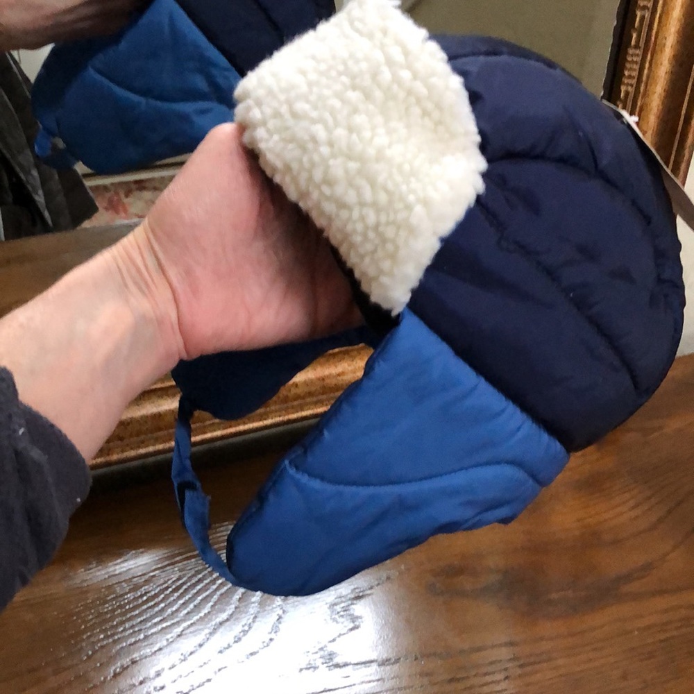 New Boys over ear puffer hat with fleece lining. Under neck velcro closure. S/M